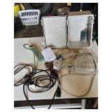 Assorted Electrical Components including APC Surge Protector, Power Strips, Extension Cords, and NEMA Enclosure