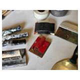 Drywall Tools and Supplies including Rolls of Tape, Trowels, and Sanding Tools