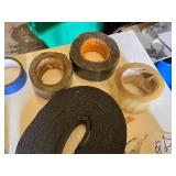 Assorted Tape and Adhesive Tools including Glue Guns, Tape Dispensers, and Plastic Mender