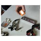 Lot of Flashlights and Headlamps Including Rechargeable LED Safety Lights, Black & Decker Work Light, and Accessories
