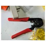 Box of Electrical Hardware and Tools including Wire Connectors, Electrical Outlets, and Crimping Tool