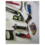 Assorted Hand Tools including Hacksaws, Hand Saws, and Measuring Tools