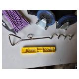 DeWalt Tool Bag and Accessories including Casters, Purple Rope, Tie Out Stake, and Small Level