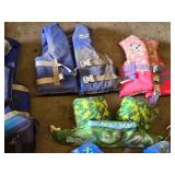 Various Life Jackets and Flotation Devices