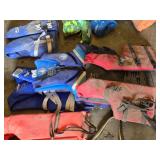 Various Life Jackets and Flotation Devices