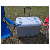 Blue and Red Folding Camp Chairs with Rubbermaid Wheeled Cooler