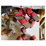 Vintage Roller Skates and Accessories Including Riedell Boots, Red Strap Skates, and Spare Wheels