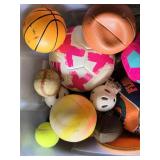 Assorted Sporting Goods Lot including Tennis Rackets, Basketballs, Volleyballs, and Footballs