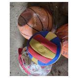 Assorted Sporting Goods Lot including Tennis Rackets, Basketballs, Volleyballs, and Footballs