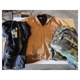 Carhartt Jacket 4XL, Camo Coveralls XL, and Black Snow Pants