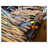 Shopping Cart full Sticks (some carved), Driftwood, and Hand Tools