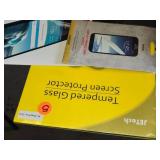 Lot of Phone Accessories including Jetech Tempered Glass Screen Protectors, Evutec Cases, and Rescue Tempered Glass for Various Devices