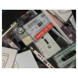Lot of Cassette Tapes and Audio Books Including "Flashdance" Soundtrack, "From Beirut to Jerusalem" by Thomas L. Friedman, and Various Maxell Blank Tapes