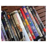 Collection of DVDs and CDs including Divergent, Spider-Man 2, and Christmas with Daniel