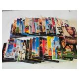 Lot of DVDs including Son of God, Lucky # Slevin, and Mean Girls with various genres and classics