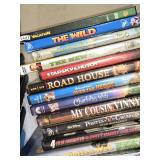 Lot of DVDs including Son of God, Lucky # Slevin, and Mean Girls with various genres and classics