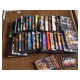 Lot of DVD Movies and TV Shows Including "Doom", "Lexx", "True Grit", and More