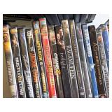 Lot of DVDs including "Pirates of the Caribbean," "Inception," and "Edward Scissorhands," among others