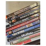 Lot of DVDs including "District 9," "American Beauty," and "The Legend of Korra Book Two: Spirits" and more