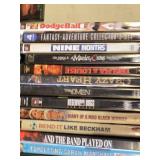 Collection of DVD Movies including "Four Rooms," "Pirates of the Caribbean," "The Perks of Being a Wallflower," and more