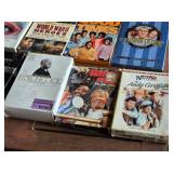 Collection of DVD Box Sets including Game of Thrones, Nip/Tuck, and Alfred Hitchcock