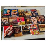 DVD and CD collection including Magnum P.I., Seinfeld, Tin Man, Burn Notice, Batman, and more