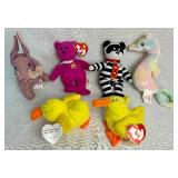 Collection of 20+ Beanie Babies and 4 Pound Puppies