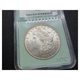 1885 O Morgan Silver Dollar NTC MS65
