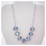 Blue Oval Crystal Necklace with Halo Setting on Silver Chain