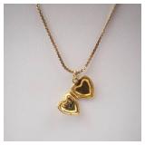 Gold-Tone Engraved Cross Heart Locket Necklace.