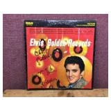 An ELVIS Vinyl LP Record with Autographs in Ink