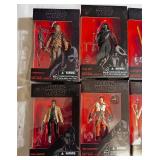 Collection of Star Wars action figures in boxes