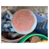 Bucket of large bolts