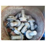 Bucket of large bolts
