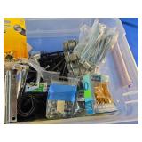 Bin of Assorted Hardware, Nuts, Bolts Hinges Etc. and Pack of 65 Watt Bulbs