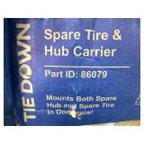 TIE DOWN SPARE TIRE CARRIER