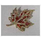 Stamped Nolan Miller Autumn Leaf Crystal Brooch