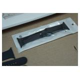 Asssortment of Apple Watch Bands and Charger