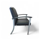 Lorell healthcare reception guest chair featuring black antimicrobial vinyl upholstery and a silver powder-coated steel frame.