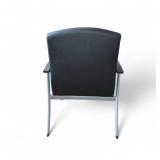 Lorell healthcare reception guest chair featuring black antimicrobial vinyl upholstery and a silver powder-coated steel frame.