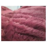 2 Faux fur decorative pillows...