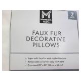 2 Faux fur decorative pillows...