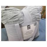 2 Faux fur decorative pillows...