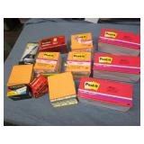 Lot of Post It notes, pens and eras...