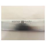 Lot of 19 WÜSTHOF Knives (3 sets), 3 WÜSTHOF Sharpeners and 2 WÜSTHOF Wood Block Holders