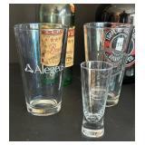 Toppling Goliath Growlers (2) & Leroux Brandy Bottle & Assorted Glassware