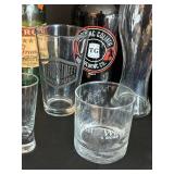 Toppling Goliath Growlers (2) & Leroux Brandy Bottle & Assorted Glassware