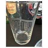 Toppling Goliath Growlers (2) & Leroux Brandy Bottle & Assorted Glassware
