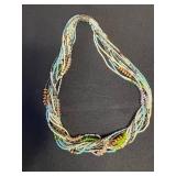 Hanging Jewelry Organizer with Clear Pockets - Includes 3 Beaded Necklaces