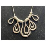 Coordinating Silver-Tone Filigree Necklace Set with Teardrop Earrings and Pendant